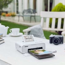 Принтер Canon SELPHY CP1300 White (2235C002), (портативный, термосублимационный, 10x15, 300x300dpi, LCD, USB, WiFi, PictBridge) белый
